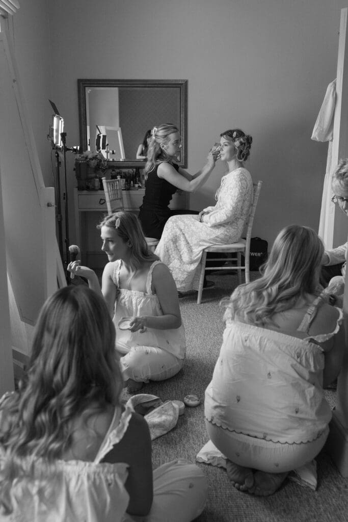 Bride getting ready with bridesmaids during morning preparations at Stockton House wedding in Shropshire